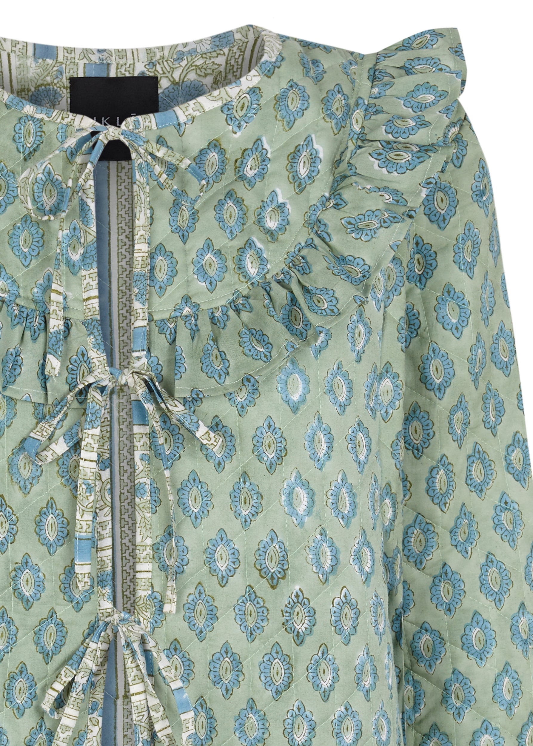 Chaqueta reversible lazadas estampado